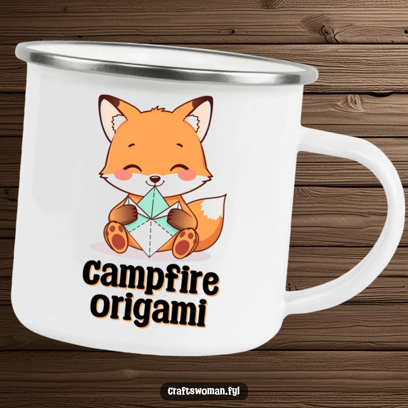 Funny Fox Camping Mug showing a smiling fox folding origami shapes, perfect for outdoor artistic inspiration.