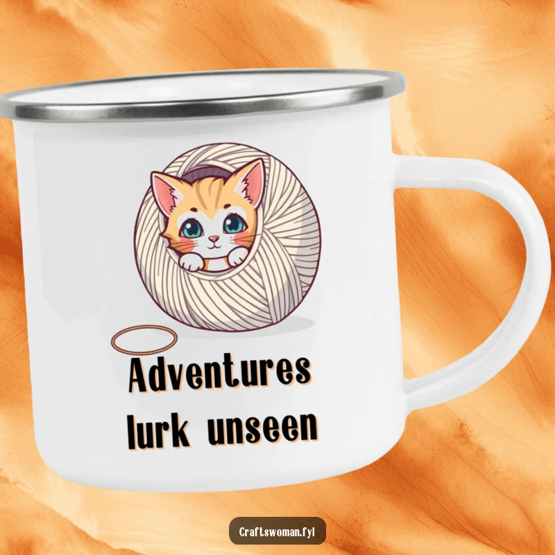 Funny camping mug showing a curious cat peeking from behind a large spool of yarn, ideal for outdoor enthusiasts.