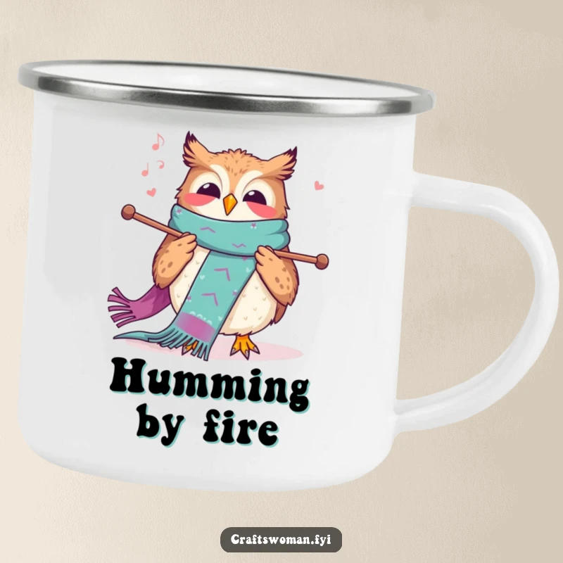 Funny knitting owl camping mug showing a joyful owl knitting a colorful scarf, ideal for rugged crafting humor.