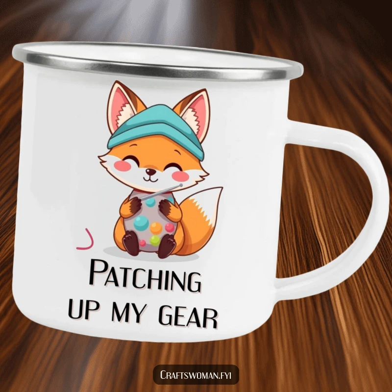 Kawaii Fox Camping Mug: A cute fox happily sews colorful fabric with a needle, perfect for outdoor crafting.