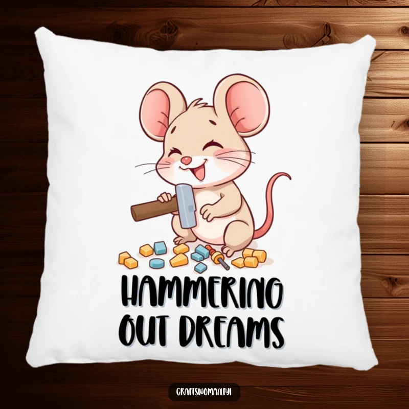 Funny mouse pillow featuring a delighted mouse character using a miniature hammer to assemble small pieces, perfect for cozy corners.