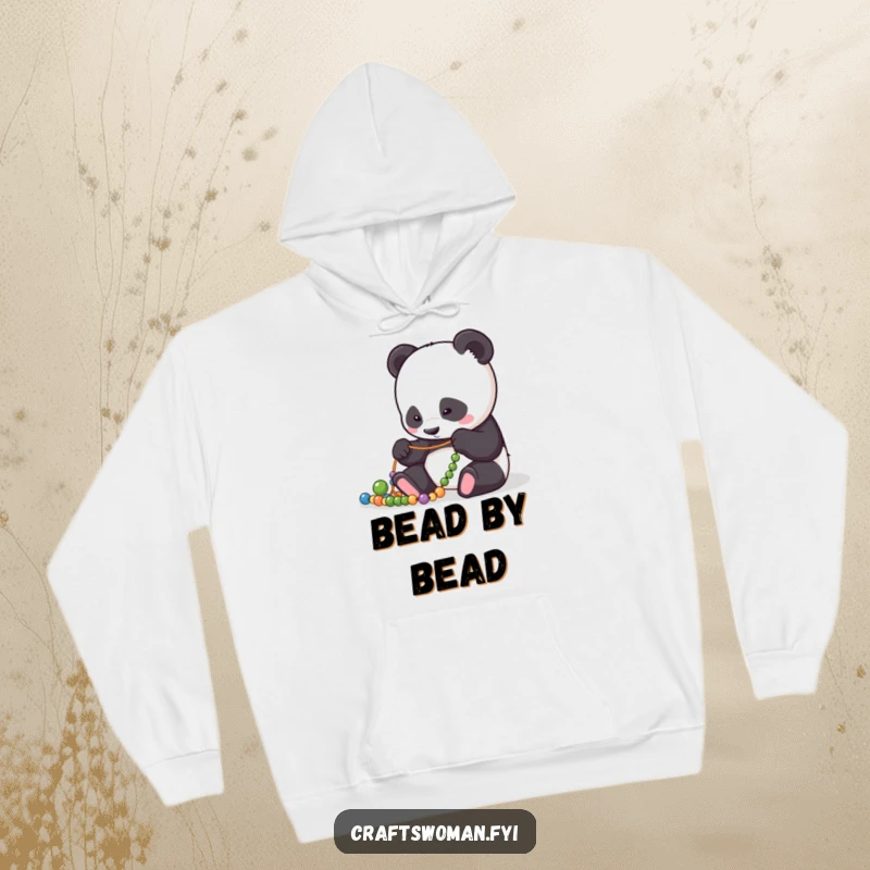 Funny Hoodie: Focused panda character intently arranging beads on a string, exuding calm concentration.
